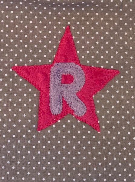 Tiny dot bib with purple initial and hot pink star